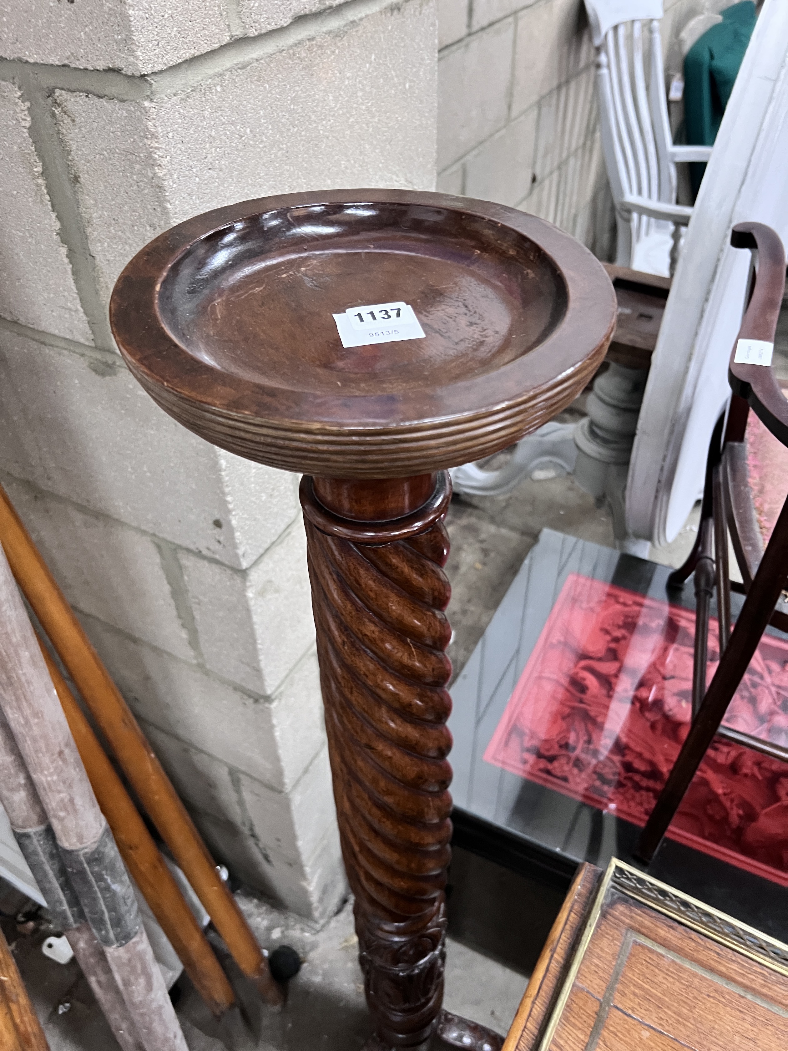 A Victorian style mahogany torchere, height 135cm